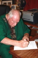 Sir Patrick Moore signing Ciaran Brown's letter